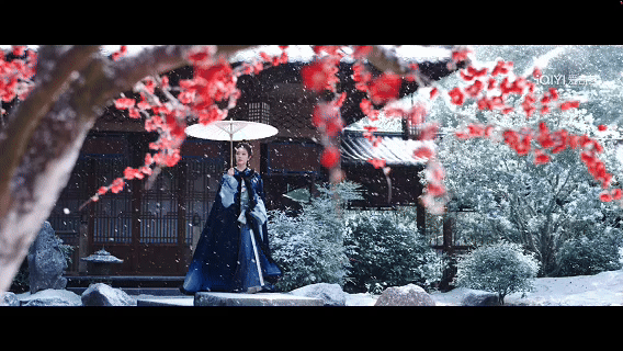 雪下撑伞3.gif